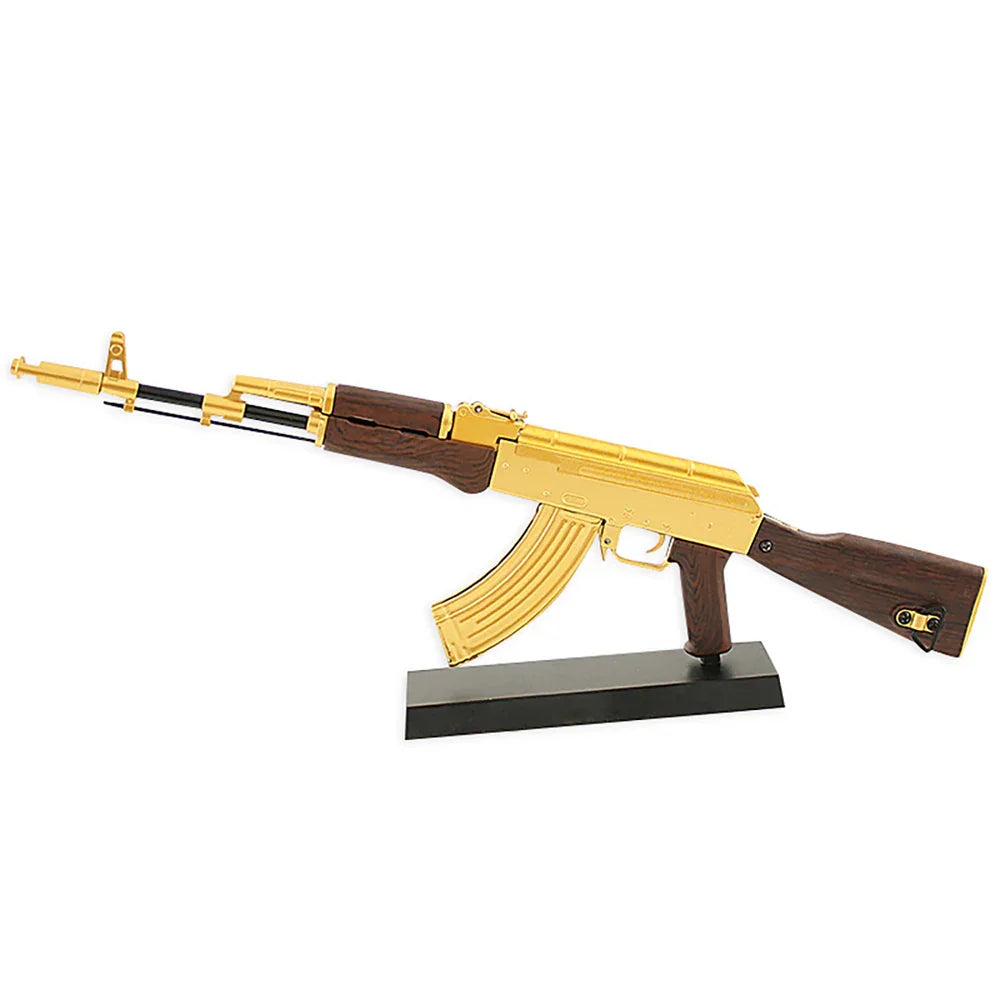 AK 47 Gold 1:3 scale miniature replica rifle with gold finish, wood-grain stock and grip, and black display stand by M1 Mini Guns, non‑firing collectible model